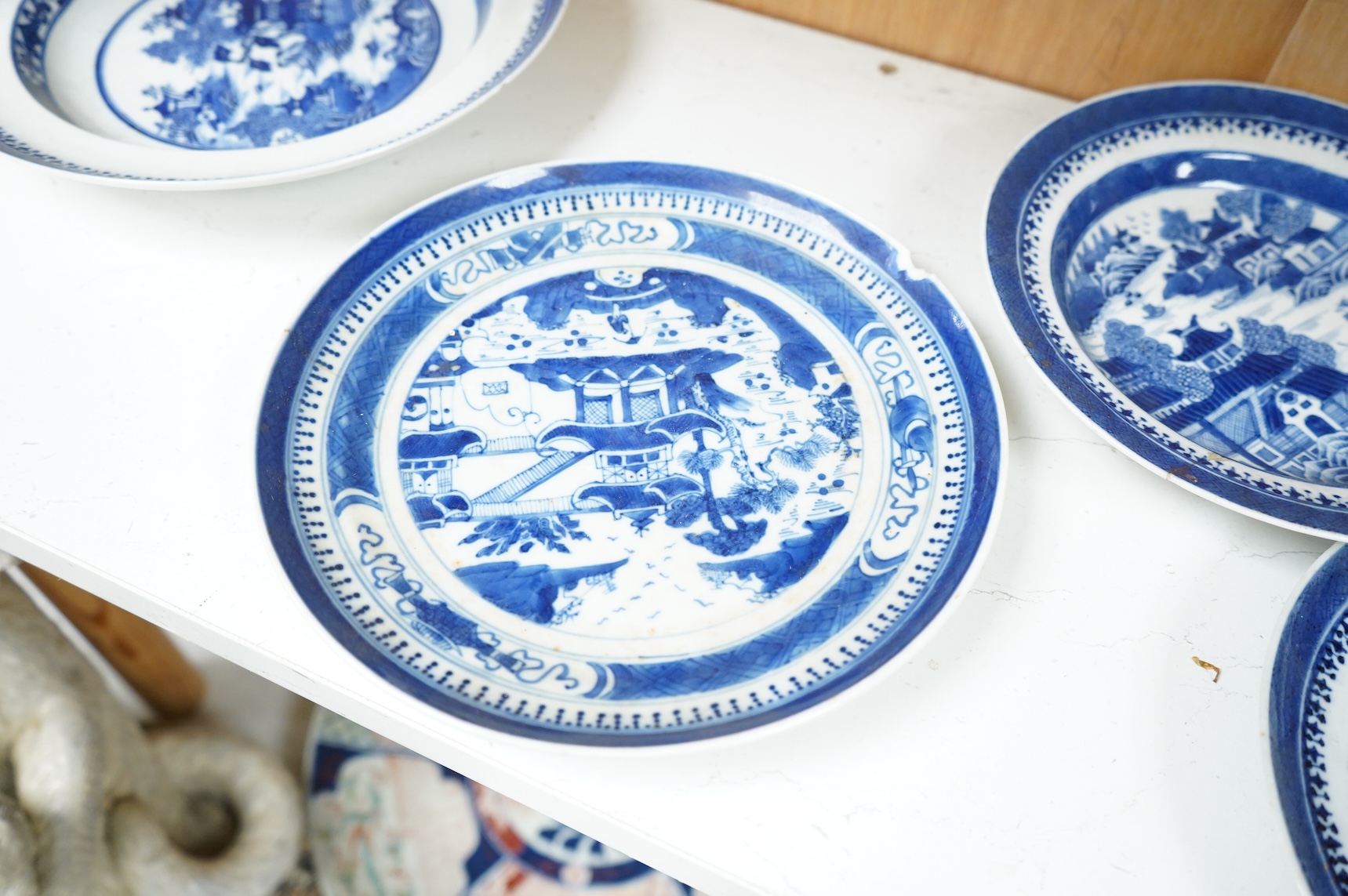 Five 18th / 19th century Chinese export blue and white plates and dishes, largest 27cm in diameter